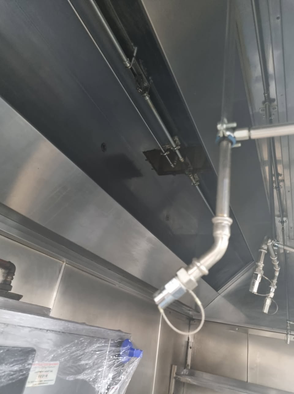 Commercial kitchen canopy cleaned by Optimal Cleaning
